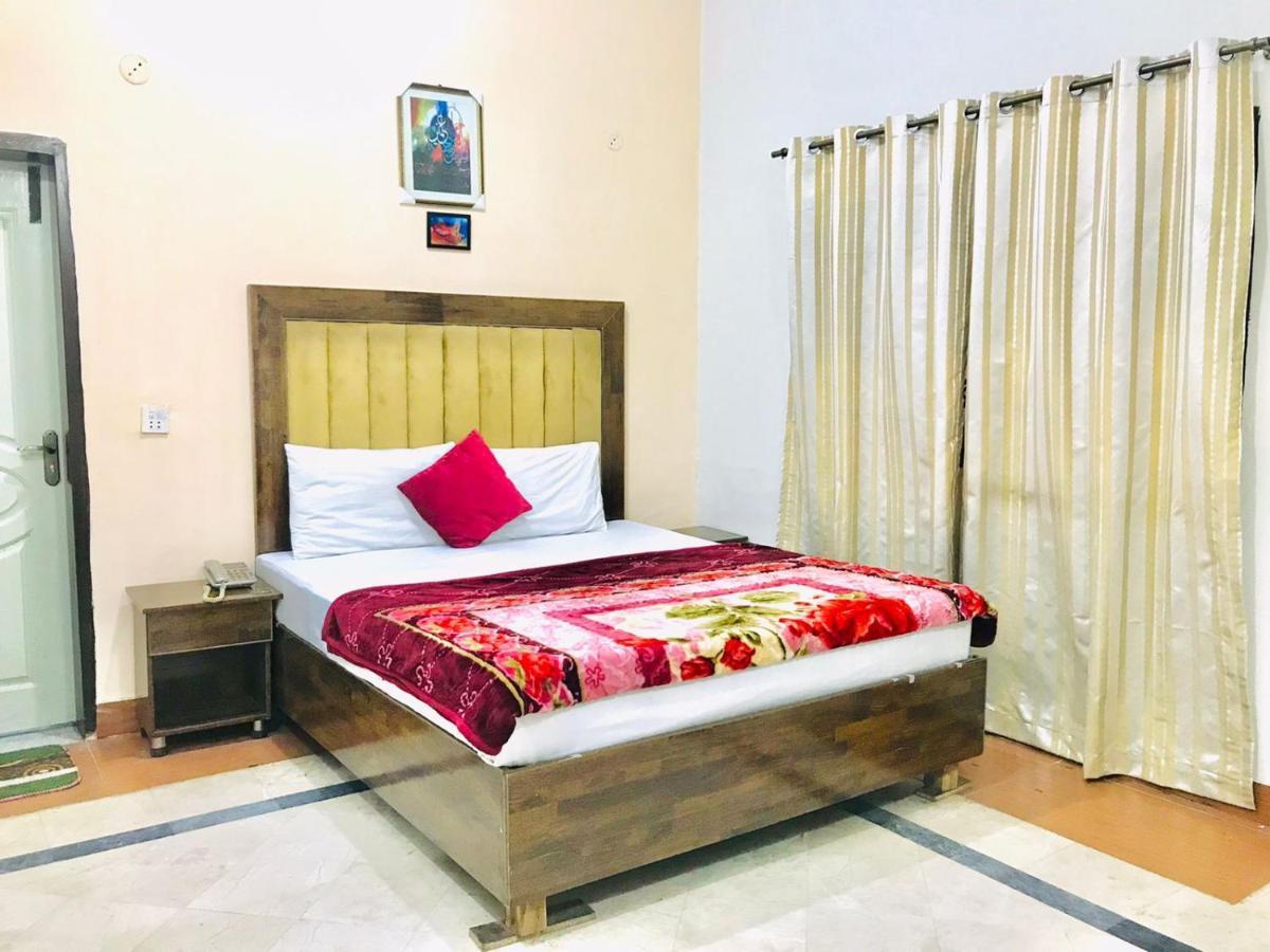 Hotel Rose Inn Lahore Exteriör bild
