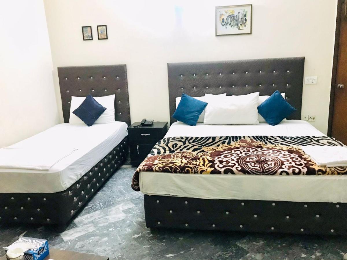 Hotel Rose Inn Lahore Exteriör bild